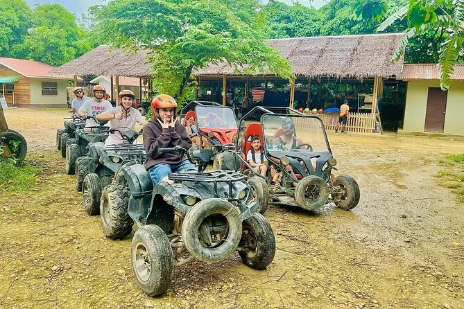 Electric ATV on a forest track inland from White Beach on a Boracay ATV tours package, Philippines